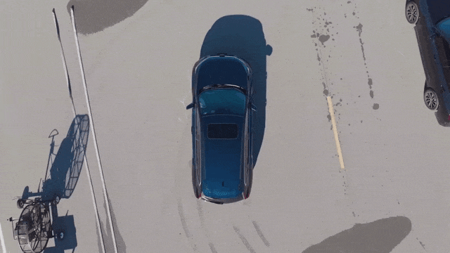 Blue SUV with awd animation of a system sending power to all four wheels