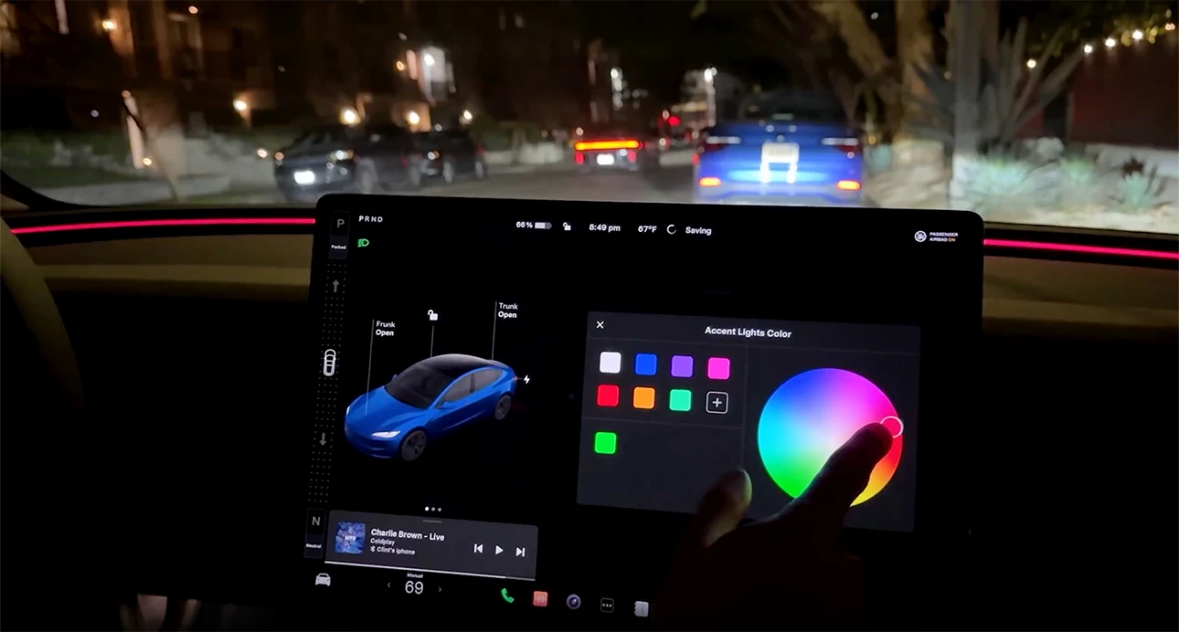 Tesla display screen with color wheel upgrade shown