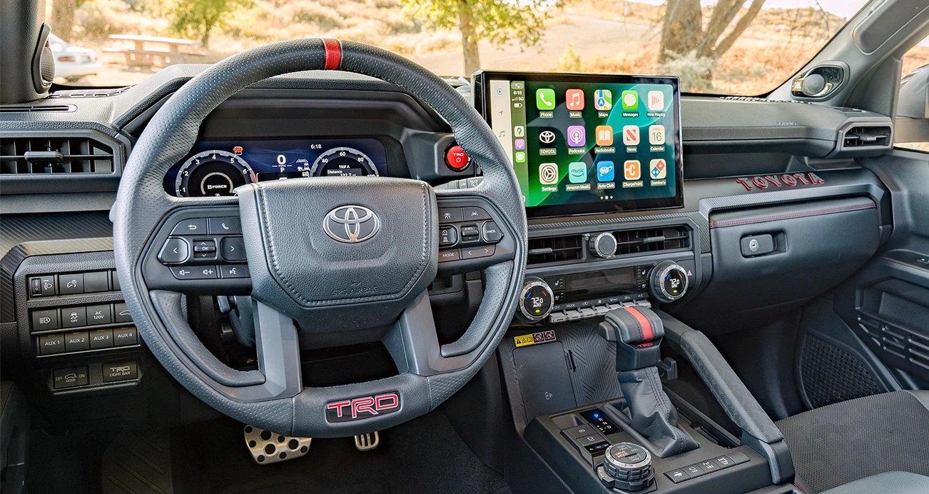 Toyota 4Runner drivers seat view of steering wheel and infotainment system 