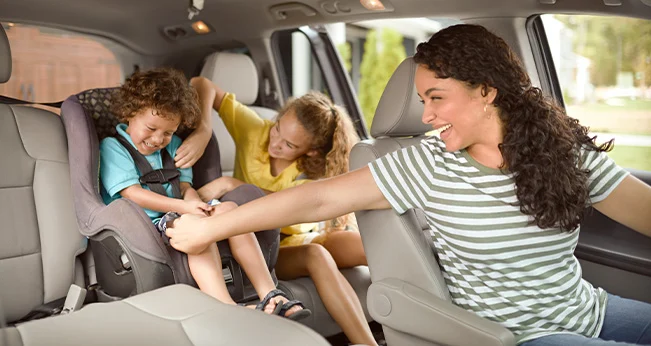 What to Look for When Buying a Used Car Online: Family in the car | CarMax