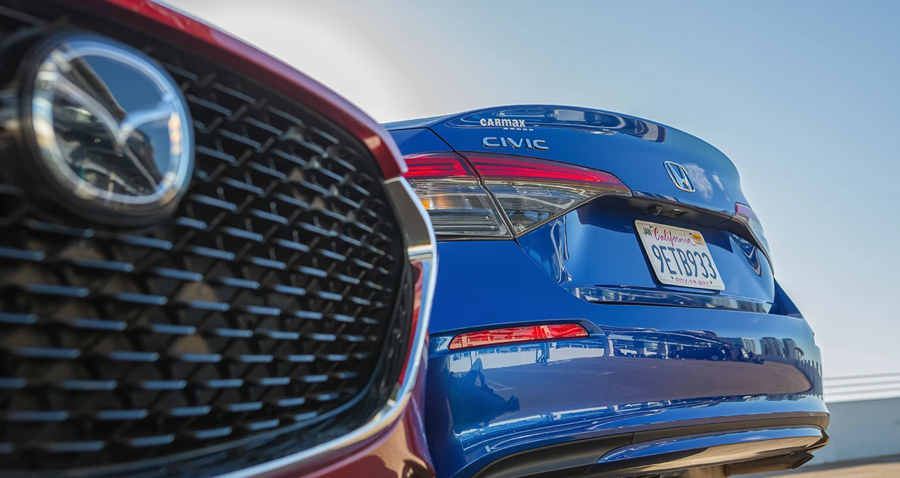 Honda Civic Mazda3 side by side logos